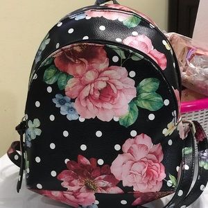 black mini backpack with flowers